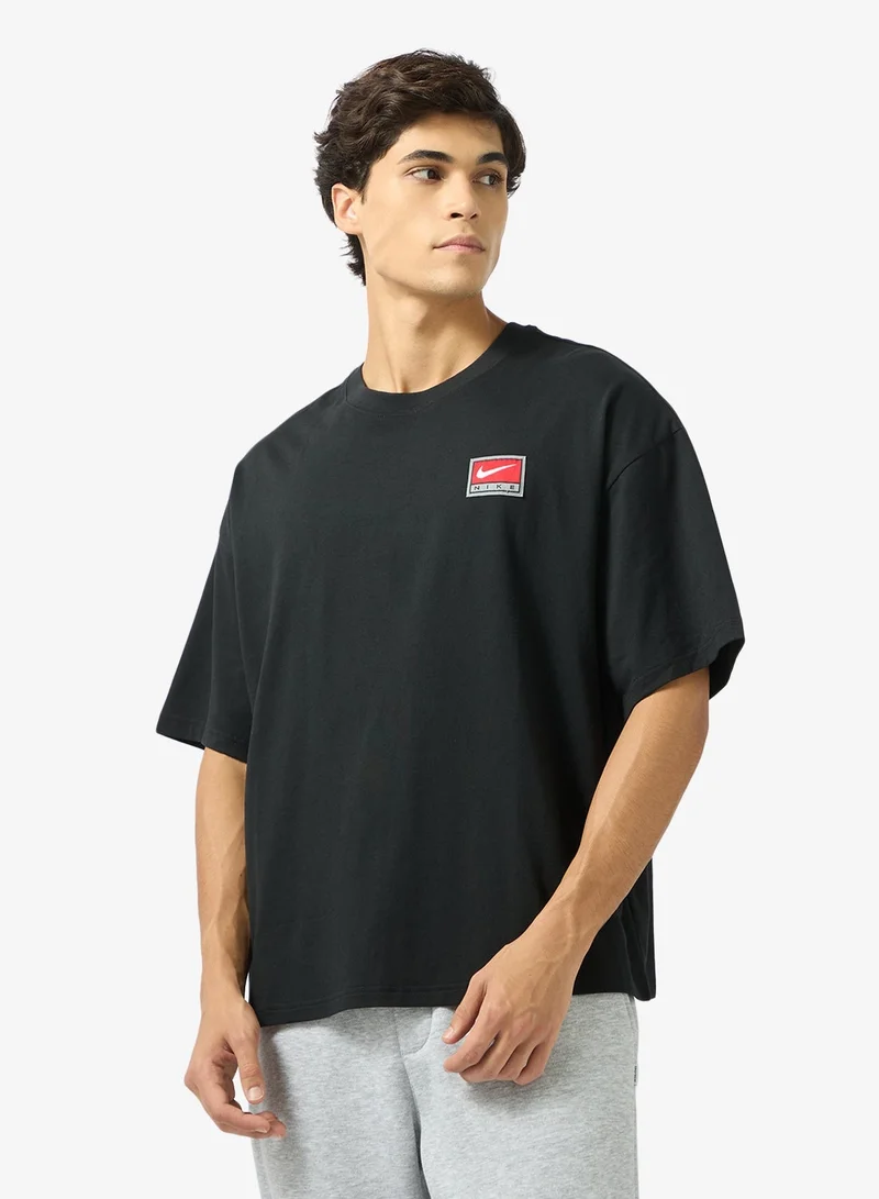 نايكي تيشيرت محبوك بقصة واسعة